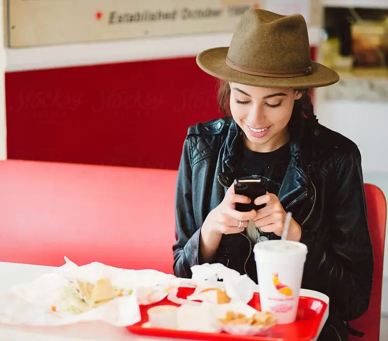 Person Texting and Eating