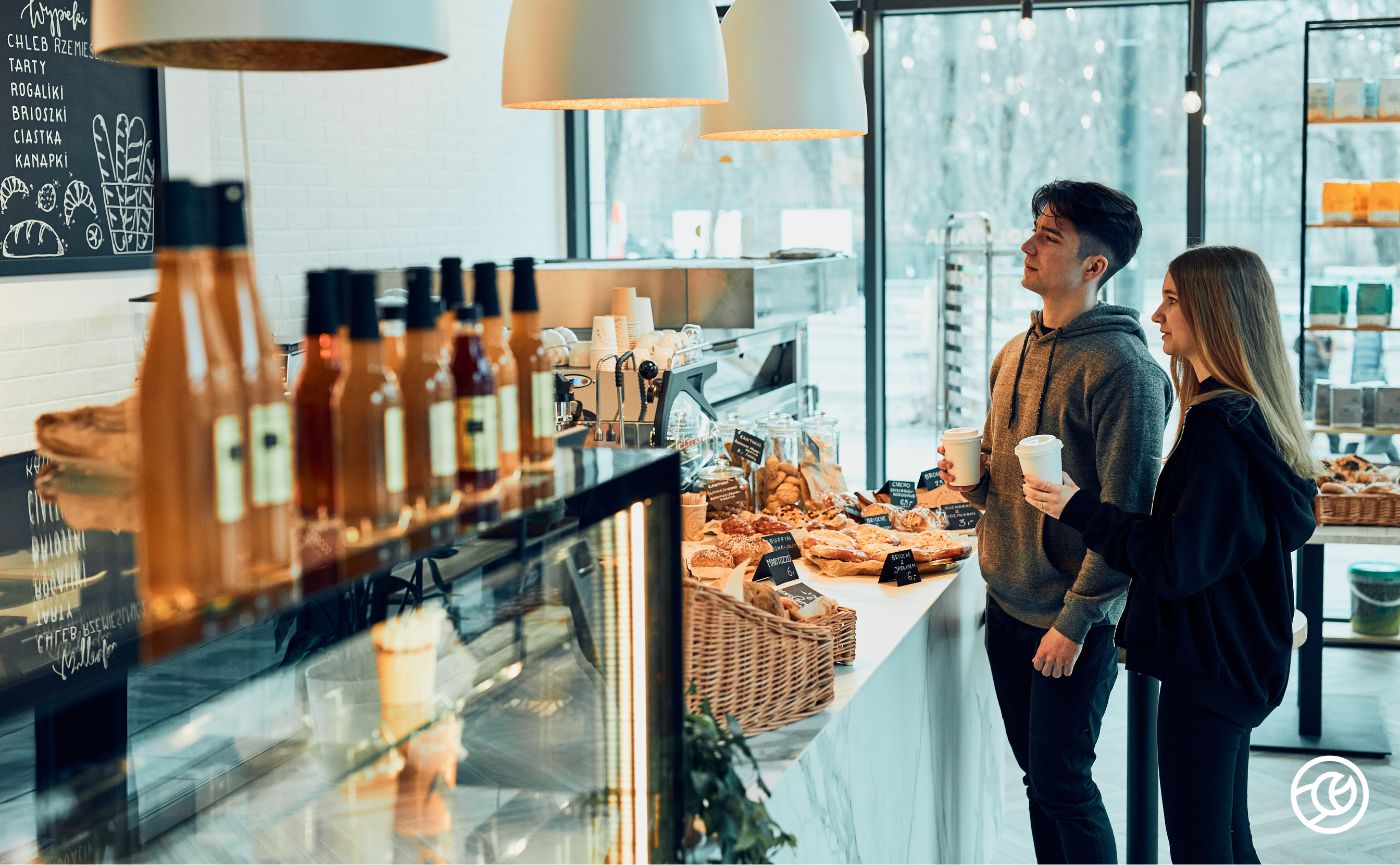 people standing in a coffee shop