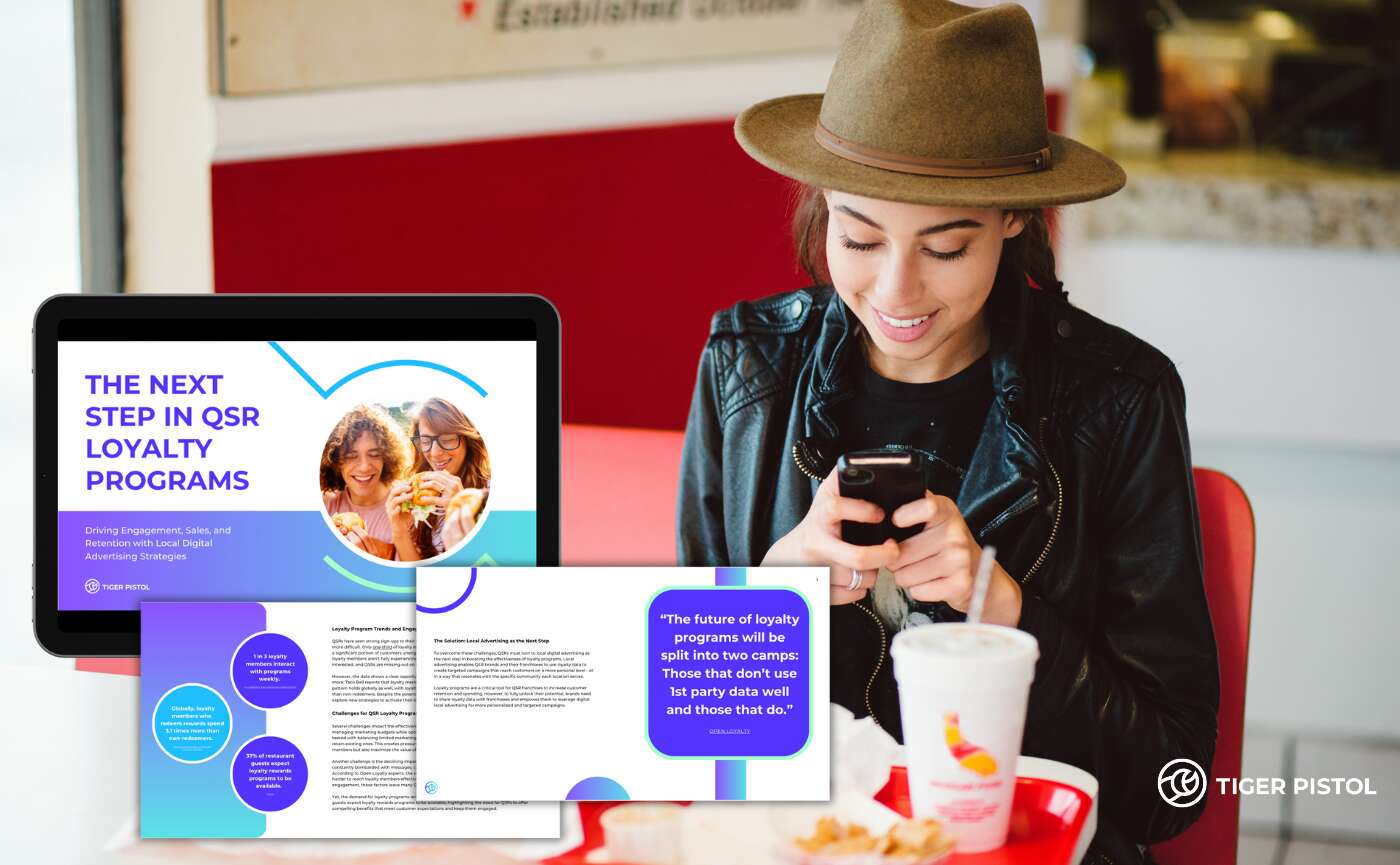 Girl in fast food restaurant on mobile phone.