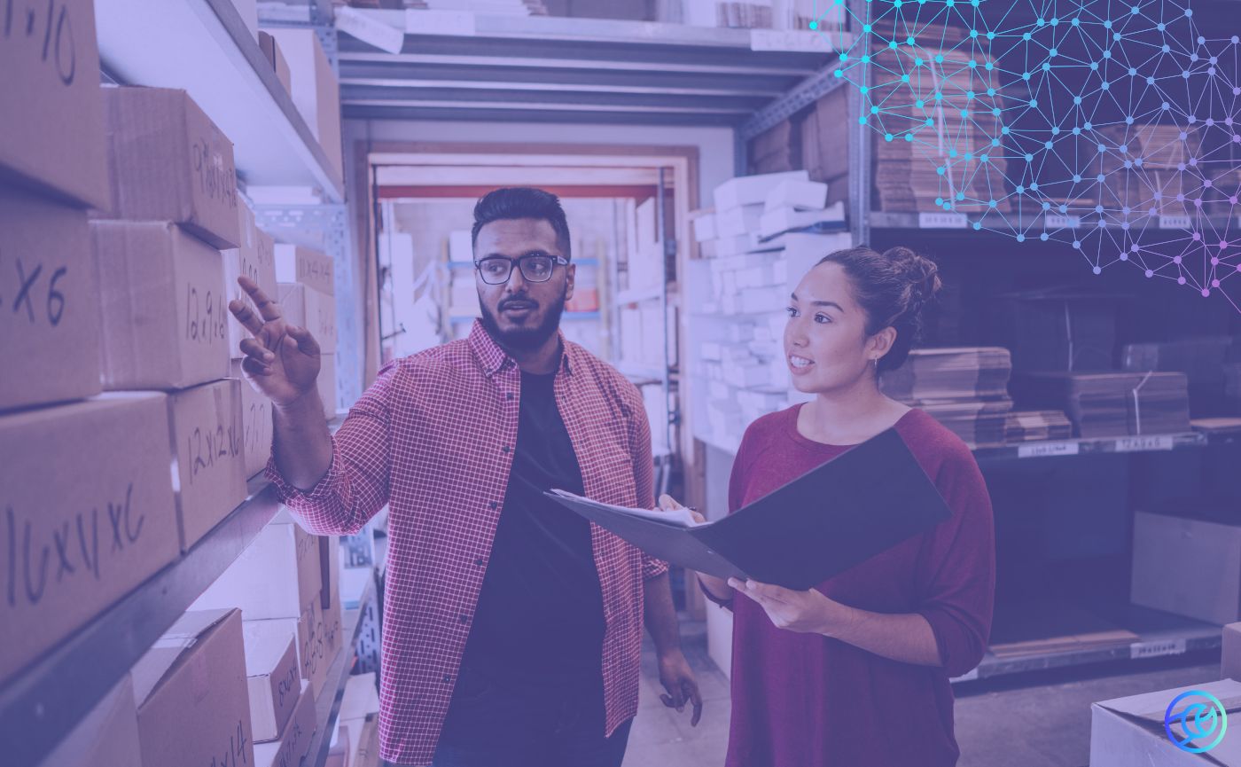 Man and woman working in a warehouse